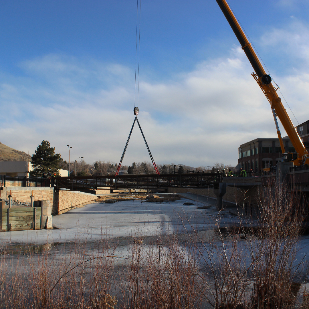 bridge suspended by crane
