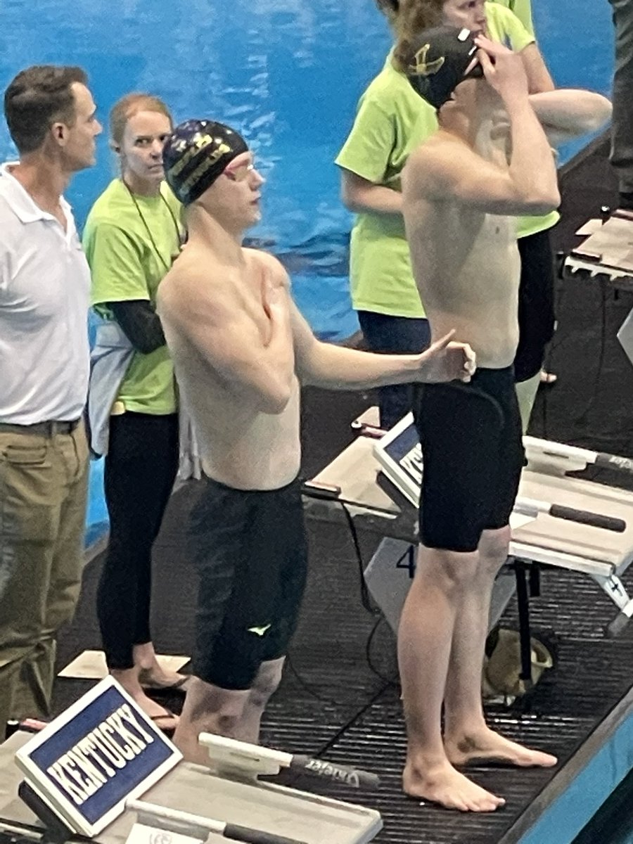 Cooler Reynolds takes 3rd in the 100 backstroke with a time of 51.40