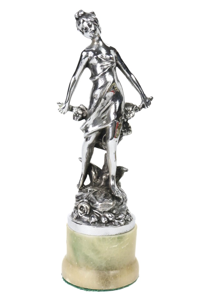 BespokeAuctions's tweet photo. SOLD for £100 in this month's sale: Lot 255 Floral Girl Mascot Now consigning for March auction. #radiatormascot #flowergirl #hoodmascot #carmascot https://t.co/ovNJ9W40A6