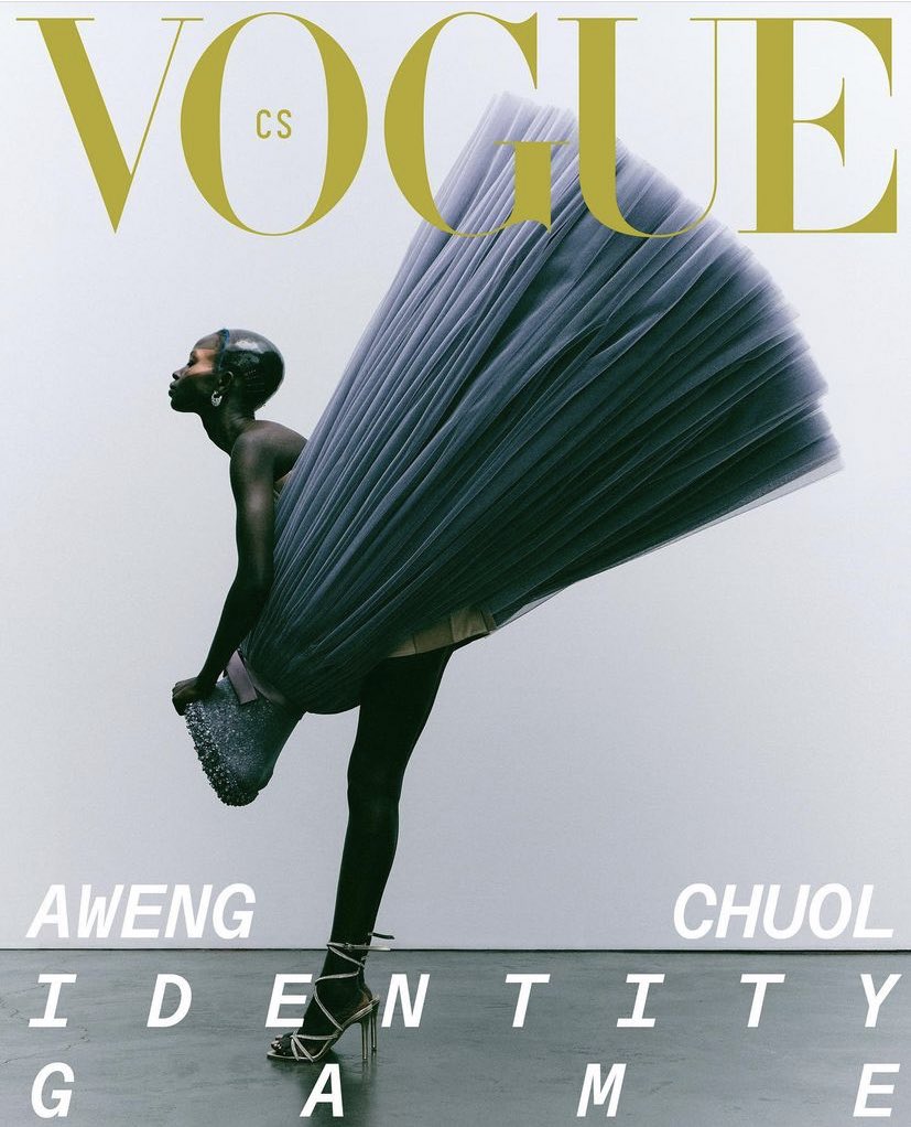IMGmodels's tweet photo. #AwengChuol wears #ViktorAndRolf #Couture on the cover of the new #Vogue CS. https://t.co/dq098foC2r
