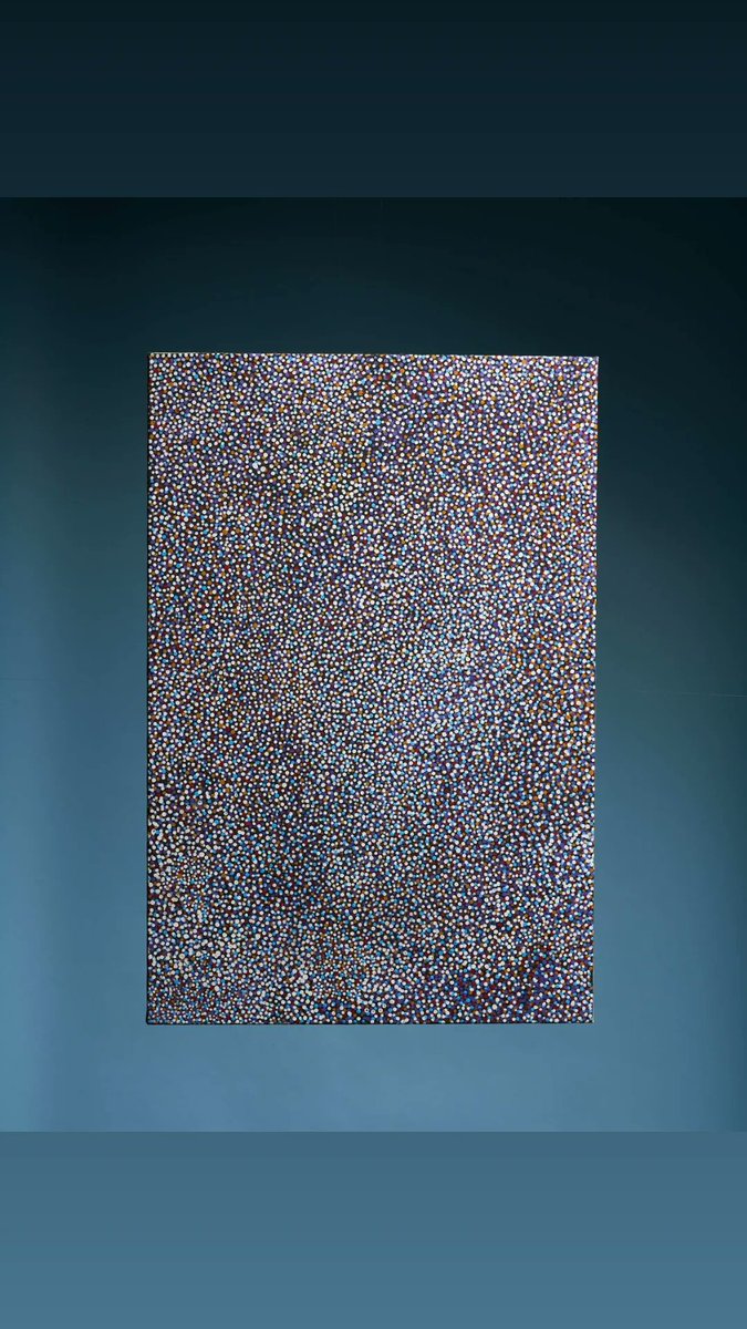 Exhibition of Australian Indigenous Art showing works on canvas from the Central, Western and Eastern Deserts of Central Australia.  A piece by Angelina Pwerle Ngala.  Bush Plum Dreaming.