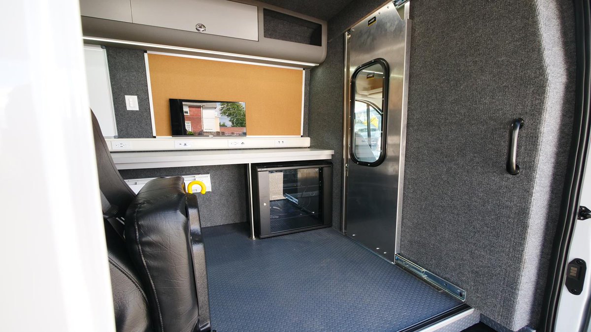 HQCustomDesign's tweet photo. This Mobile Command center is dispatched to provide onsite assistance in times of an emergency. Whiteboards, storage space, workstation tables, upper shelves, refrigerator, TV displays, USB outlets, ventilation fan, electrical awning with hybrid system. https://t.co/3k21np8qy2 https://t.co/9rHMEpc0nG