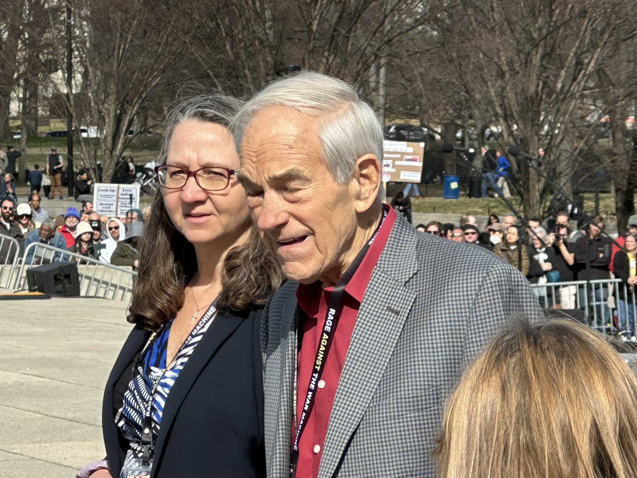 A protester holding a placard saying U.S. war machine: real threat to  peace at a rally against war with Russia sponsored by multiple groups  including CODEPINK: Women for Peace, Black Alliance for