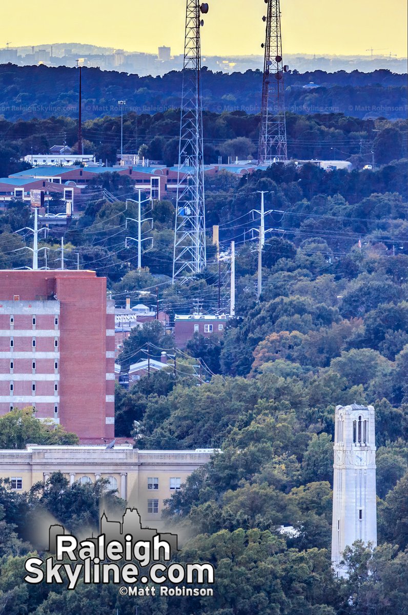 metroscenes's tweet photo. The skyline of UNC Chapel Hill and the NC State Bell Tower together in one photo. https://t.co/giUpQAqdsI