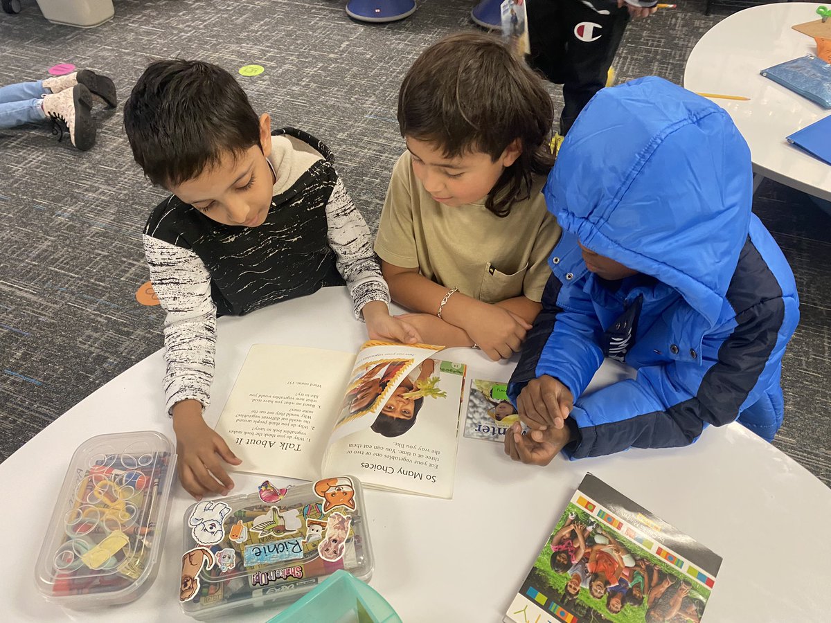 MsWomack1st's tweet photo. Students discussing their “Think Marks” together in their books (parts that caught their eye). I love watching my kids collaborate and share out what they learned with each other! @SpearsElem #FISDmadetoshine https://t.co/o6uvOHxYJG