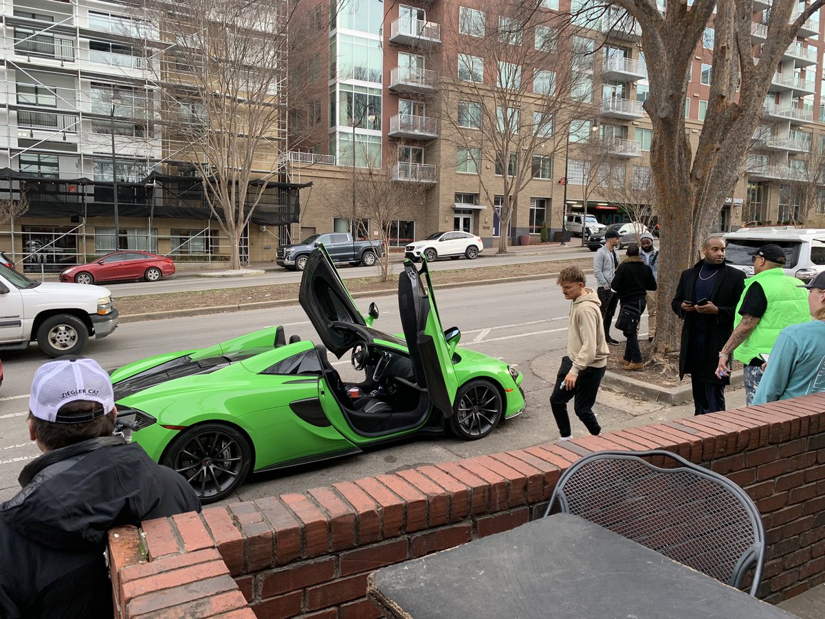 KyleFernandez2's tweet photo. My favorite part about living in Nashville is watching grown men hire a photographer to take pictures of them in their luxury rental car https://t.co/bC48Z5JGfU