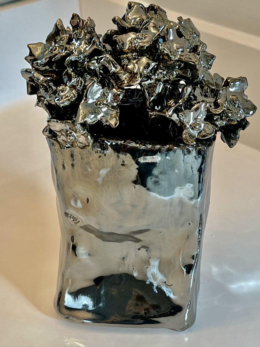 Porcelain Hydrangeas.
The palladium glaze has an atomic number of 46…one less than silver.  #ceramics #flowers #art