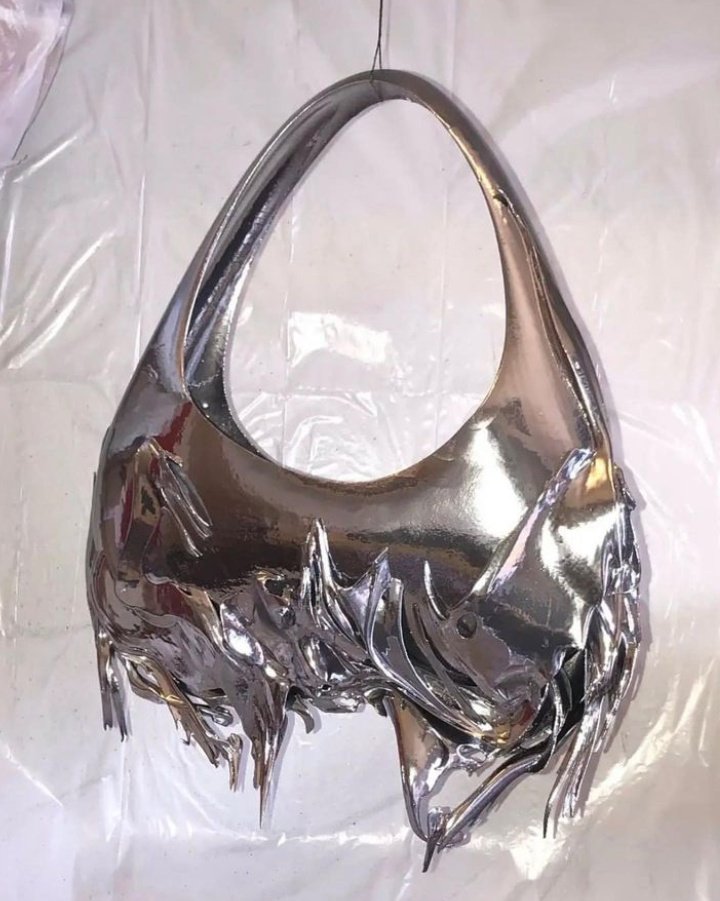 DvilCouture's tweet photo. This Metallic Bag By Gnastiy is so to die for omg! I need it!! 
Ig @/gnastiy.com_ https://t.co/m8ZFc9qfW5