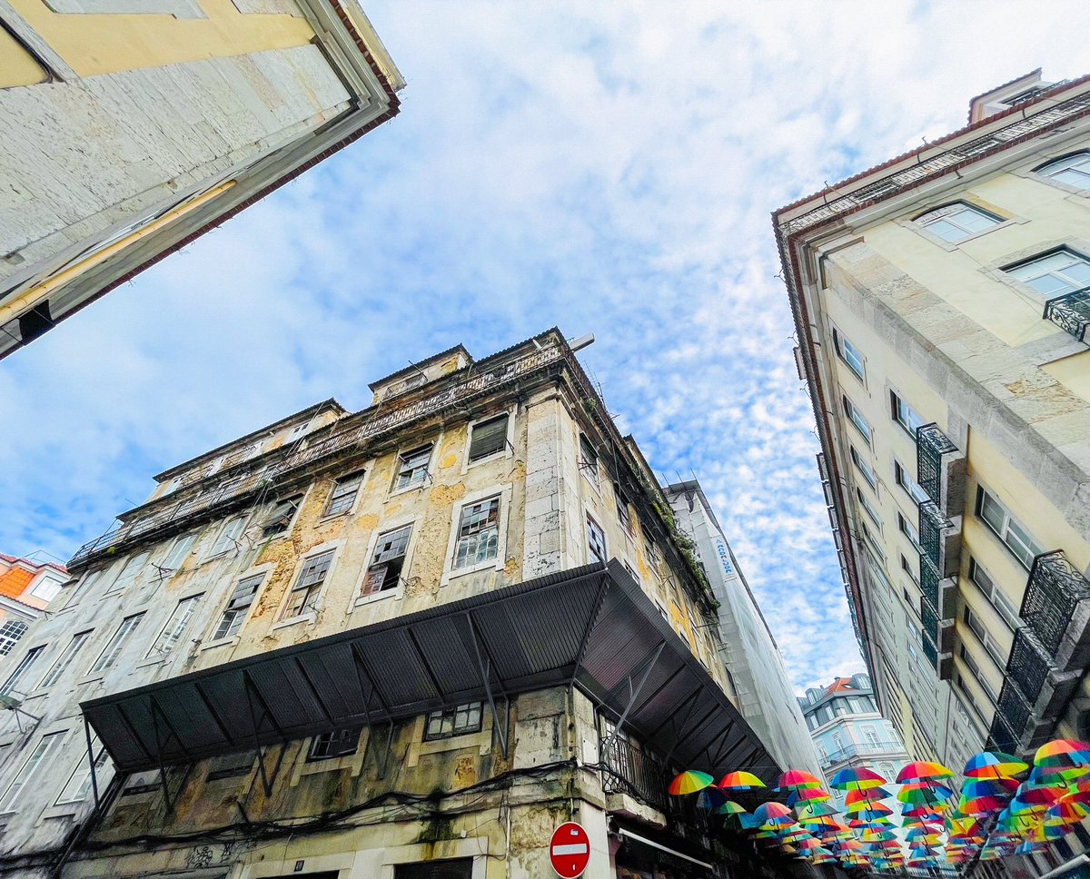 #pinkstreet #lisbon #portugal #🇵🇹 #umbrella #umbrellas #architecture @visitportugal