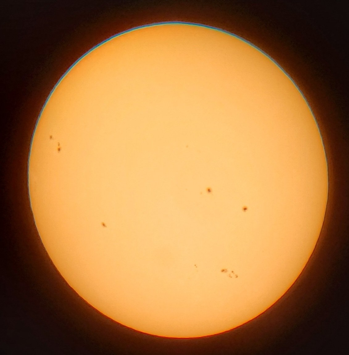 SpaceMike99's tweet photo. Took this earlier in the week when I got out the telescope to show my class what a star really looks like. Sun's getting pretty active again. https://t.co/DojT86g0zO