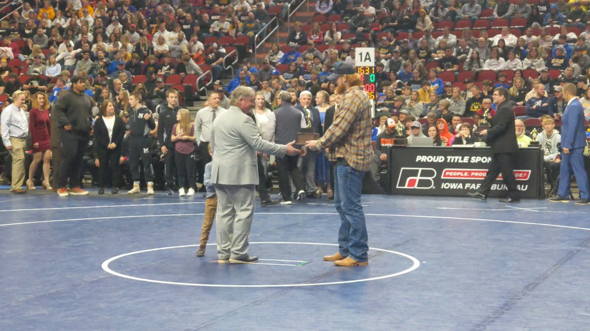 Before the state finals Coach Kooi was honored as a recipient for JH Coach of the Year!
He was accompanied by his grandson Theo &amp; presented the award by Ko Kieft!
Relationships matter &amp; those that have wrestled for Coach know this is true! #attitudeofgratitude #sharper