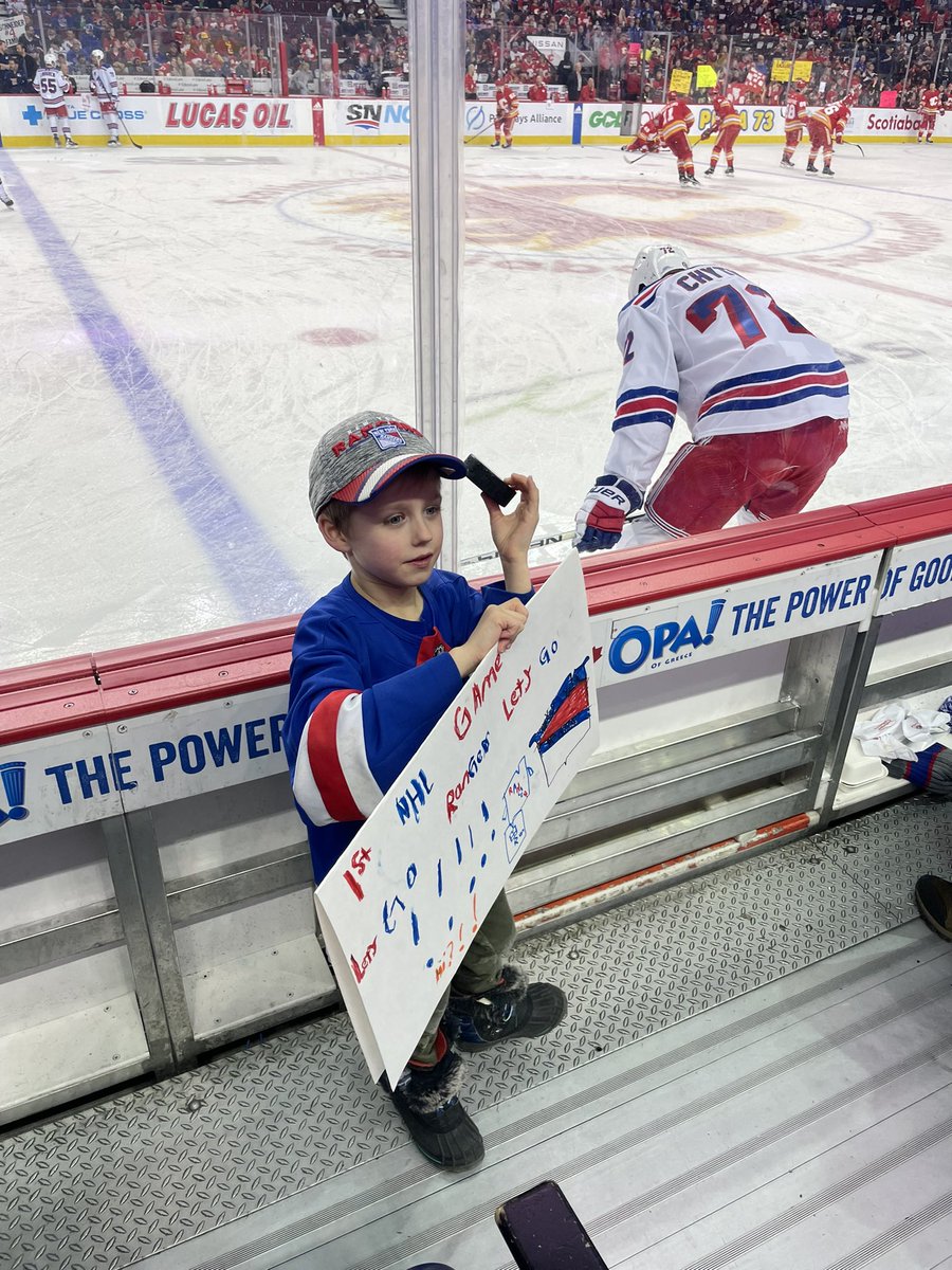 SaskGregger's tweet photo. So glad to spend #FamilyDay weekend taking this guy to his first @NHL game It’s a memory we’ll all share for a long time. I don’t know if @V_Trocheck will ever know how much it meant him tossing a puck over the glass to my son #rangers #firstnhlgame #warmups #trochek #panarin https://t.co/Ks4Dn2Yu4q