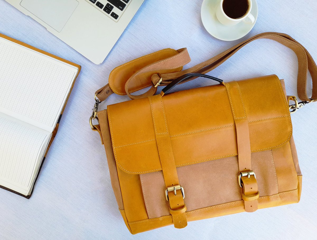 HaregDesigns's tweet photo. Our Mota vintage style Laptop Bag is exquisitely constructed and suitable for those who seek quality without compromise!

#handmade
#MadeinEthiopia https://t.co/SDXvucUyRW