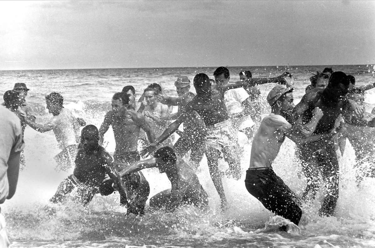 BeschlossDC's tweet image. Black history in Florida:  White segregationists try to prevent Black protesters from entering water at segregated beach, St. Augustine, Florida, 1964: