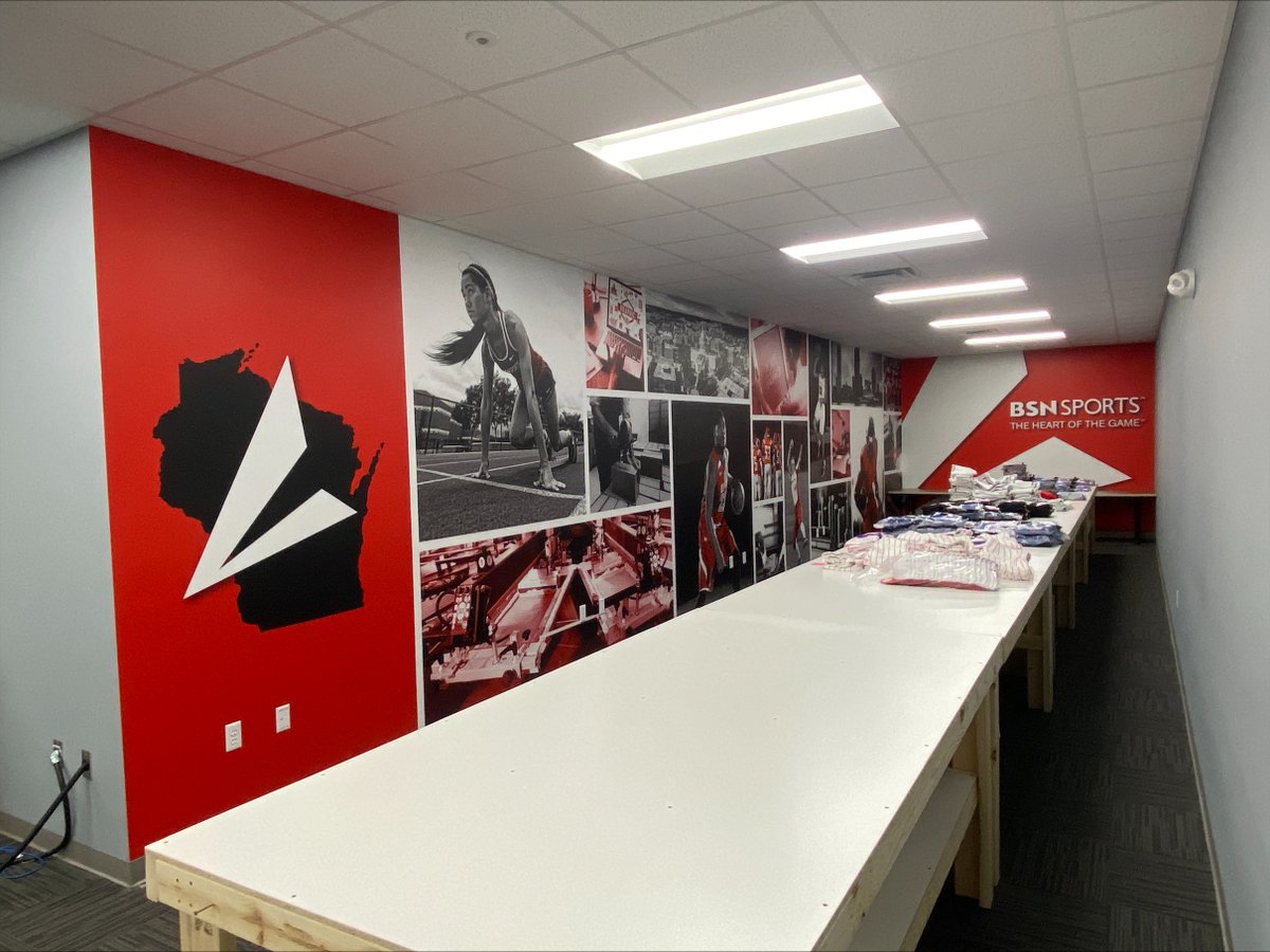 fanaktive's tweet photo. Our graphic artist Kaitlyn took some boring gray walls and brought them to life at the BSN Sports Waunakee office! 🤩 Contact us today to order your wall murals for your school or office! #fanaktivemarketing #wallmurals #largeformatprinting @BSNSPORTS https://t.co/EAkZMOxNe3