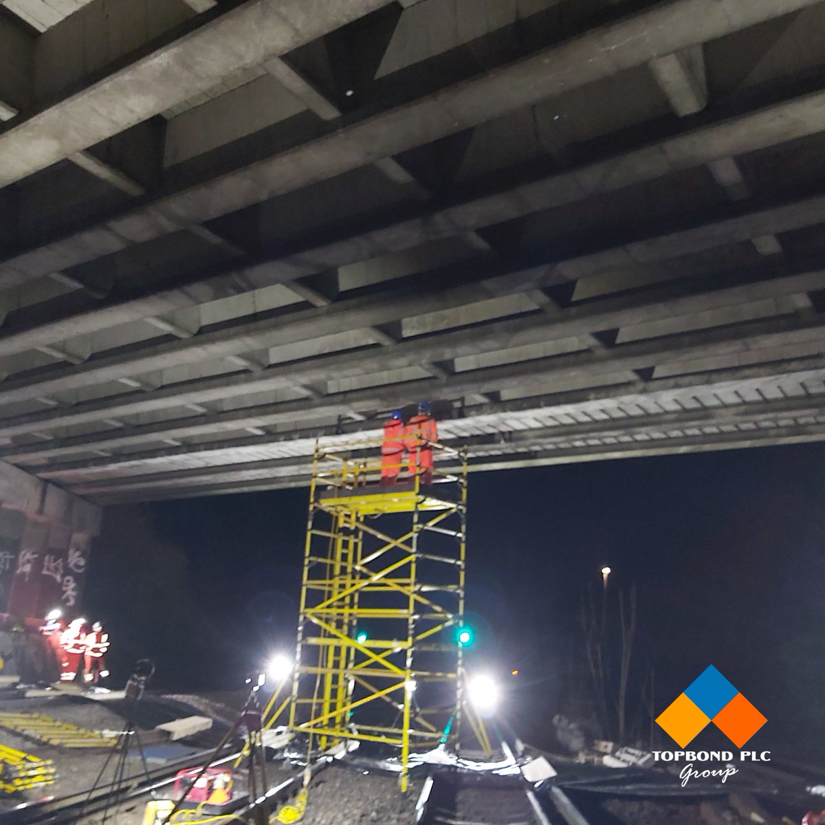 Spalling soffit concrete represented a major risk to the underlying main line railway in the London area. At short notice our site team removed the concrete under a 24 hour possession. 

The bridge was left in a safe condition and the line can continue to run as usual.

#Railway