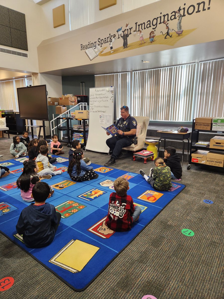 LibraryLadyLV's tweet photo. We love when Officer Harris and K9 Marley from @CCSDPD come to read during #NevadaReadingWeek! #CCSD https://t.co/4o0SPzGGoT