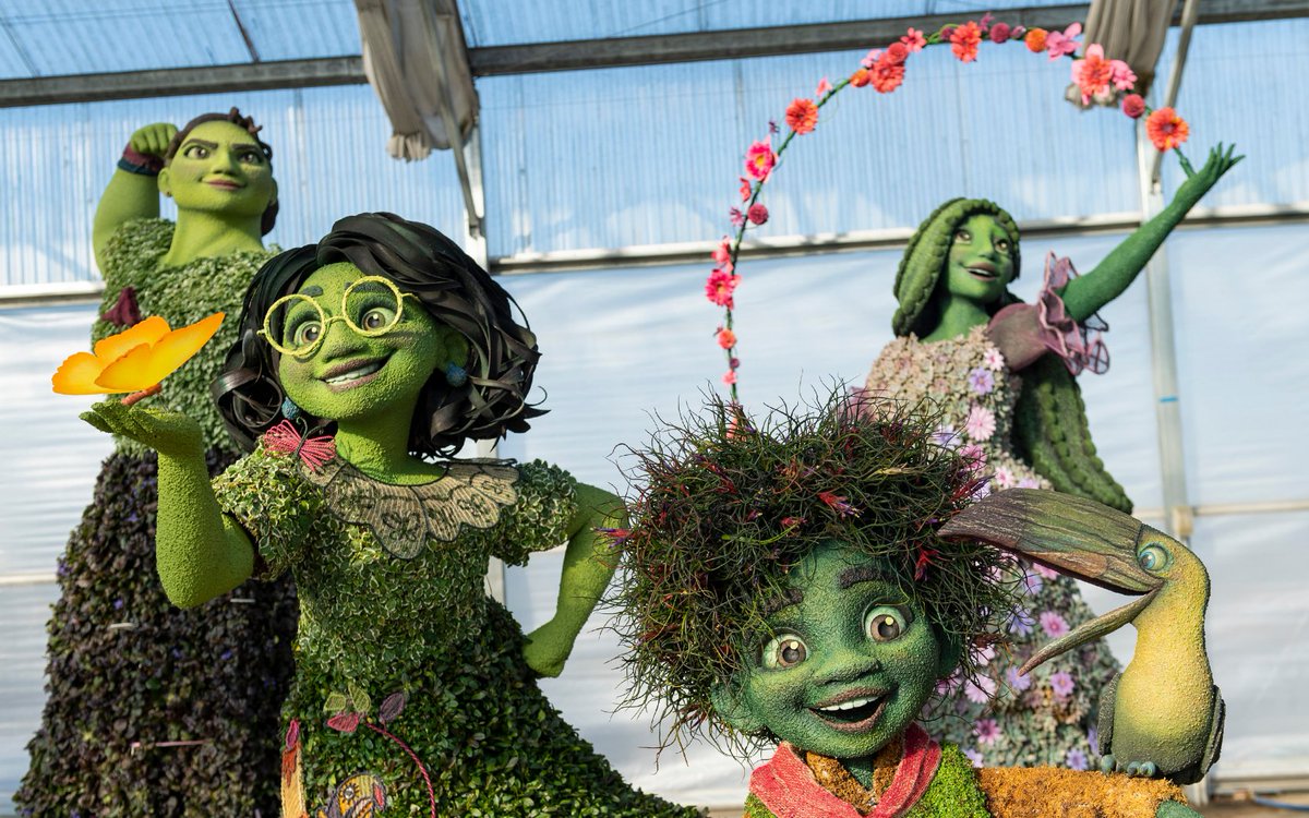 ScottGustin's tweet photo. Walt Disney World has shared a first look at Princess Tiana and Encanto topiaries that will be part of the EPCOT International Flower and Garden Festival starting March 1. https://t.co/pyFDRrVFBs