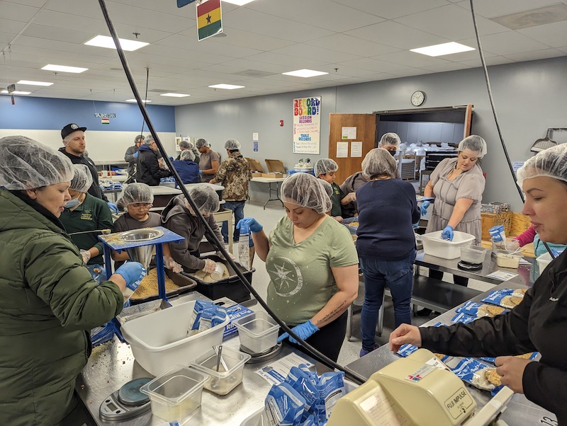 2nd graders &amp; middle schoolers from Ms. Coker's class spent the morning in service w/ <a href="/fmsc_org/">Feed My Starving Children</a> They worked hard to weigh &amp; package food for families.  Service is part of our mission to prep young people to make a positive difference locally/globally. #servicelearning #agcchicago