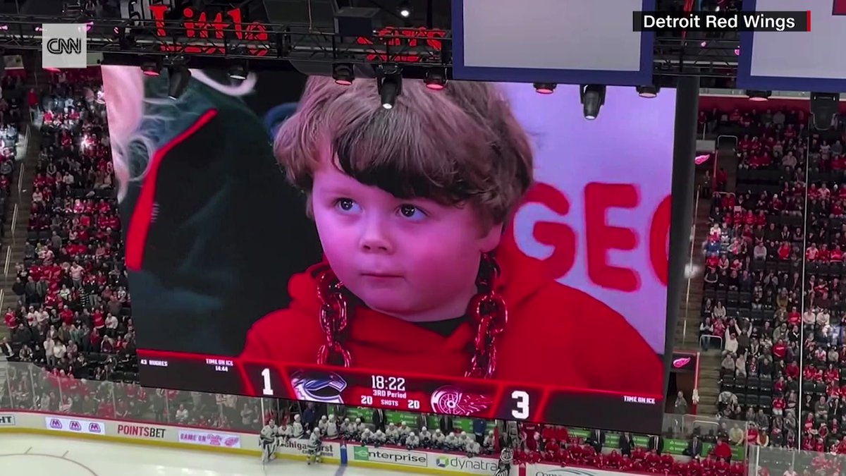 CNN's tweet photo. Adorable George goes viral for wondering why the crowd is cheering for him at the 4-year-old's first hockey game. https://t.co/w7p2HQ2rjY