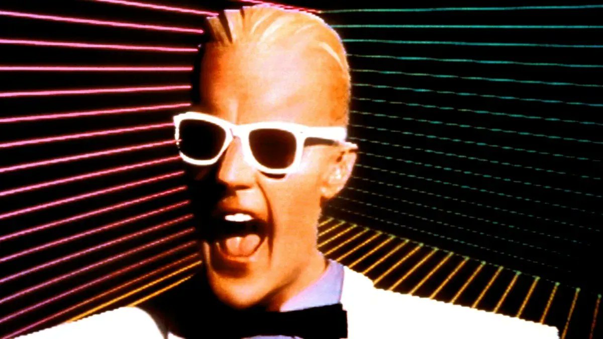 Remember Max Headroom? Here is a good story behind the 80s A.I. Icon. Will be see a revamp using LLM or generative bot? More here: buff.ly/3Izii7S #AI #TV ##maxheadroom