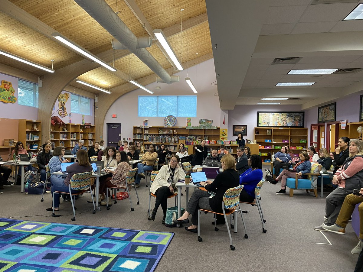 Jones Dairy Elementary staff enjoying the generosity of our school community and the JDE PTA!  Part one of the Media Center Makeover complete! #ThankyouPTA