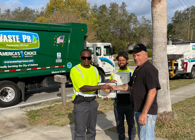 Waste_Pro_USA's tweet photo. #CaringForOurCommunities - Waste Pros Antone and Donmarco were recognized by Deltona Commissioner Jody Lee for their professionalism and dedication to caring for the Deltona community! #Community #Family #WastePros  #WasteProWay #GarbageGuys #Waste #GoWithThePros #Team https://t.co/qzgXJ9BrZ3