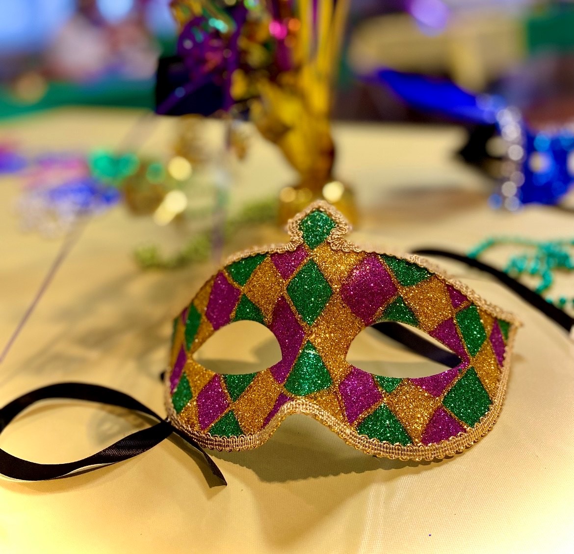 FranciscanHCC's tweet photo. Our recent ER3 celebration was all about "Letting the good times roll" at our Mardi Gras themed event! #MardiGras2023 #ER3 #TrilogyLivng https://t.co/PJzCNcXYil