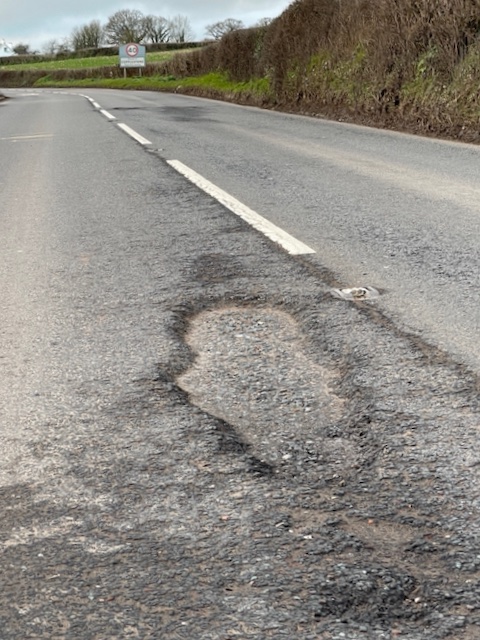 Mark4Devon's tweet photo. So this is not some 'B' road or some back-lane this is the main road from Exeter to Barnstaple (A377), one of the top-5 roads in #Devon. Just outside #Copplestone . The #Conservatives on Devon County Council have clearly given up on maintaining our infrastructure. 🧵1/3 https://t.co/dG4mjpFoXw