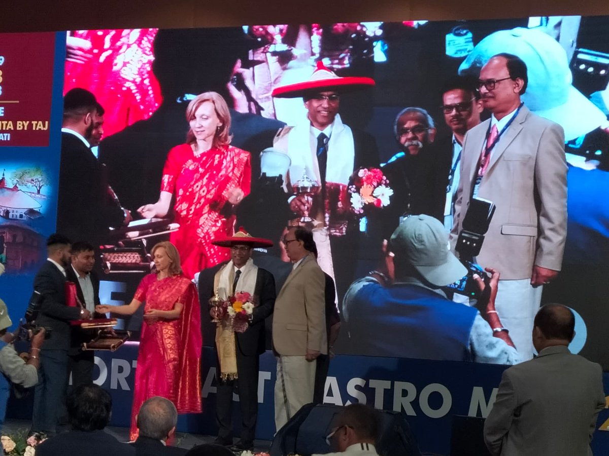 Receiving a plaque, gamusha, Xorai (bell metal product), Japi (Assamese headgear) and a bouquet after delivering Dr. RM Saikia memorial oration at the NEGM meeting at Guwahati, India. Humbled with the warm hospitality by Dr. BD Goswami and his wife (Elena) ⁦@AASLDtweets⁩