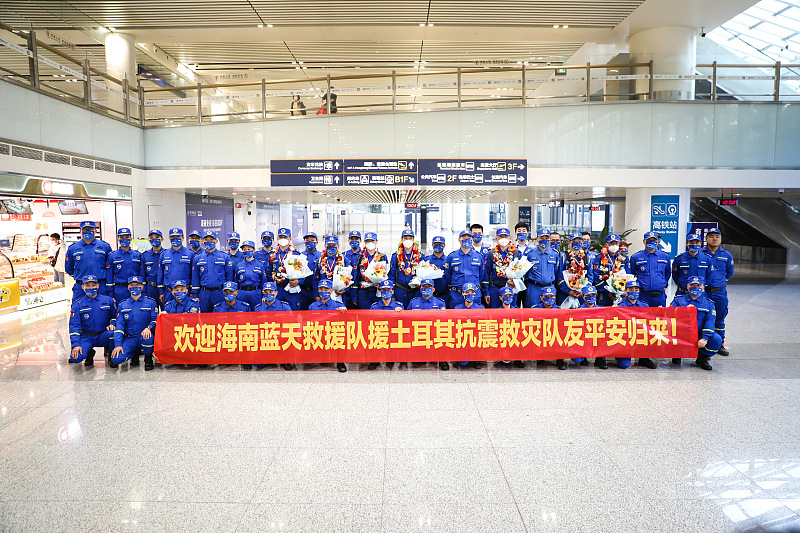 PDChina's tweet image. Members from the Blue Sky Rescue branch in S China's Hainan returned home on Monday. Blue Sky, a Chinese civil relief squad, has sent 103 rescue teams to Türkiye's quake-hit areas, and a total of 145 people, including 8 survivors and 137 victims, were found by them.