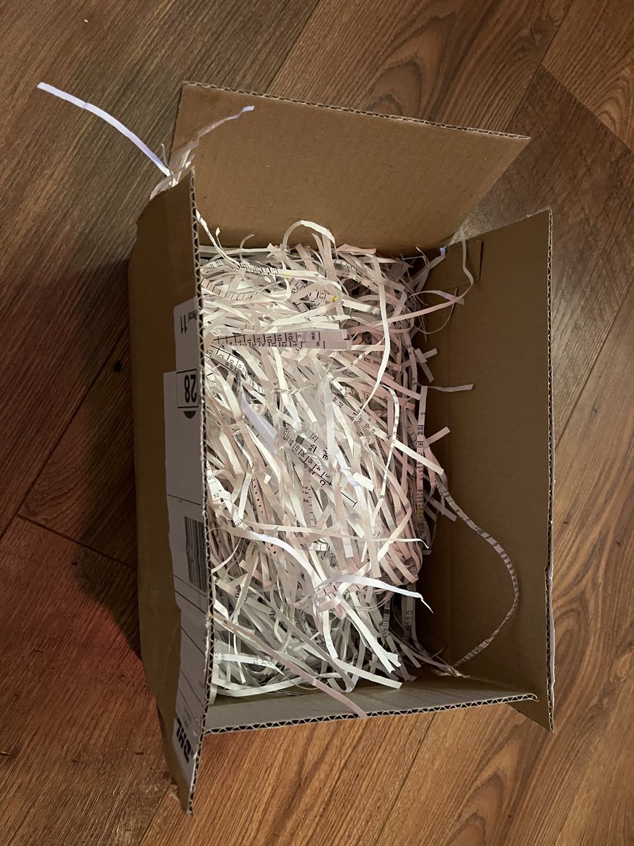 Just received shredded administration from a webshop as package padding. Who's in for a puzzle?