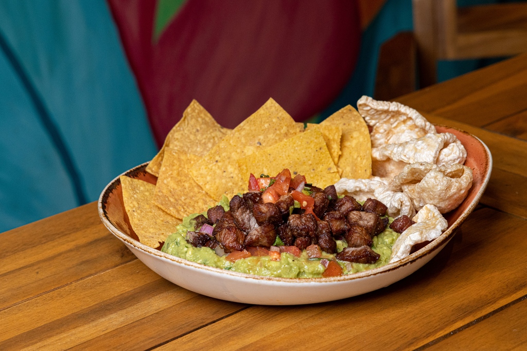 jaguarestaurant's tweet photo. Our Guacamole is made to order! It includes pork rinds and corn chips. #JaguarInsiderTip Add crispy steak bites and thank us later 🫢 https://t.co/tfvAYYweDM