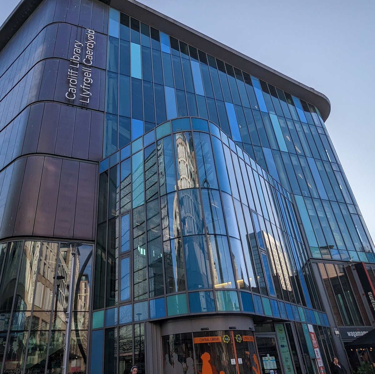 People in Cardiff have shown strong disapproval for cuts in library opening hours in the budget proposal. <a href="/cardiff_people/">Cardiff People's Assembly</a> also organised a protest on Saturday outside the Central Library for it. <a href="/DrRoundglasses/">Adam Johannes</a> said, There's a library crisis with over 1000 libraries closed in UK