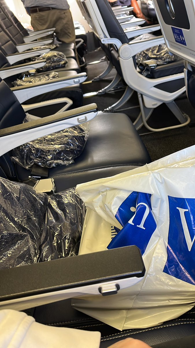 “After watch the stupid movie can you keep a secret I can’t wait to see which hot beefy American stud startup founder sits next to me on my flight to Houston!” … the seats: