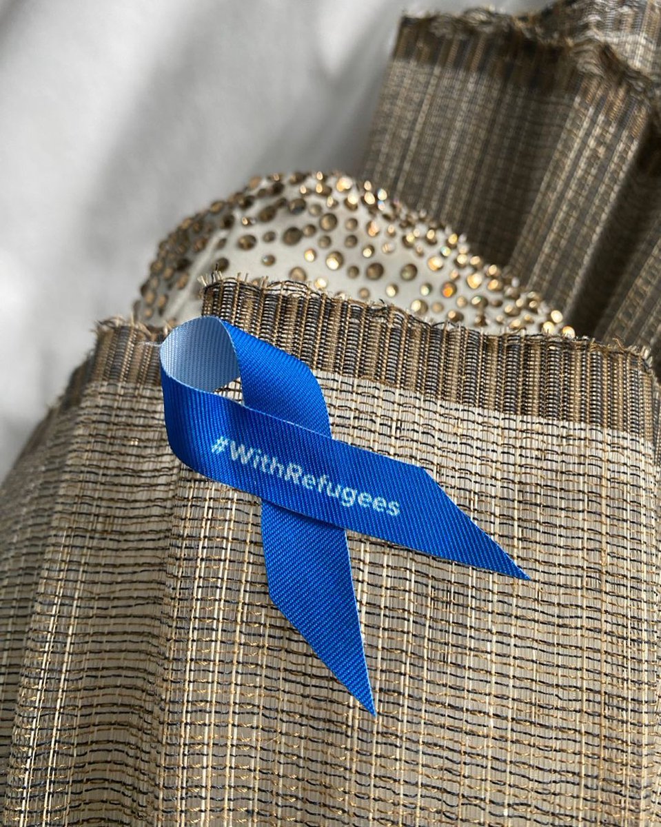 ‘QUEEN WITH A PURPOSE’ 💙 LOOK Filipino pride Dolly de Leon wears a blue ribbon at the 2023