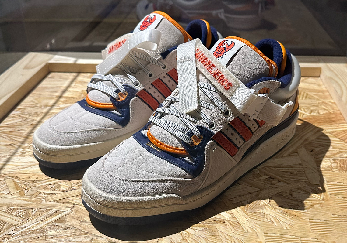 Describe the Bad Bunny x adidas Forum Buckle Low "Cangrejeros de Santurce  with one emoji