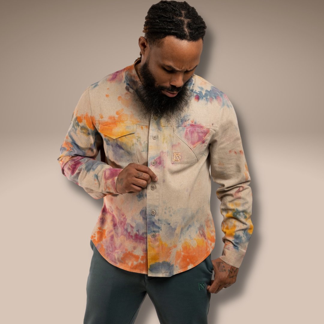 The Beige Tie Dye Herman is a shirt that can fit in any season and various occasions.⁠
⁠
Available now at brianamericus.com, link in bio.
⁠
🧔🏾‍♂️: @ahki_dc⁠
📸: @mixiament⁠
⁠
#apparelarchitect #athleisure #casualwear #classystreetwear #dapper #unique #workwear