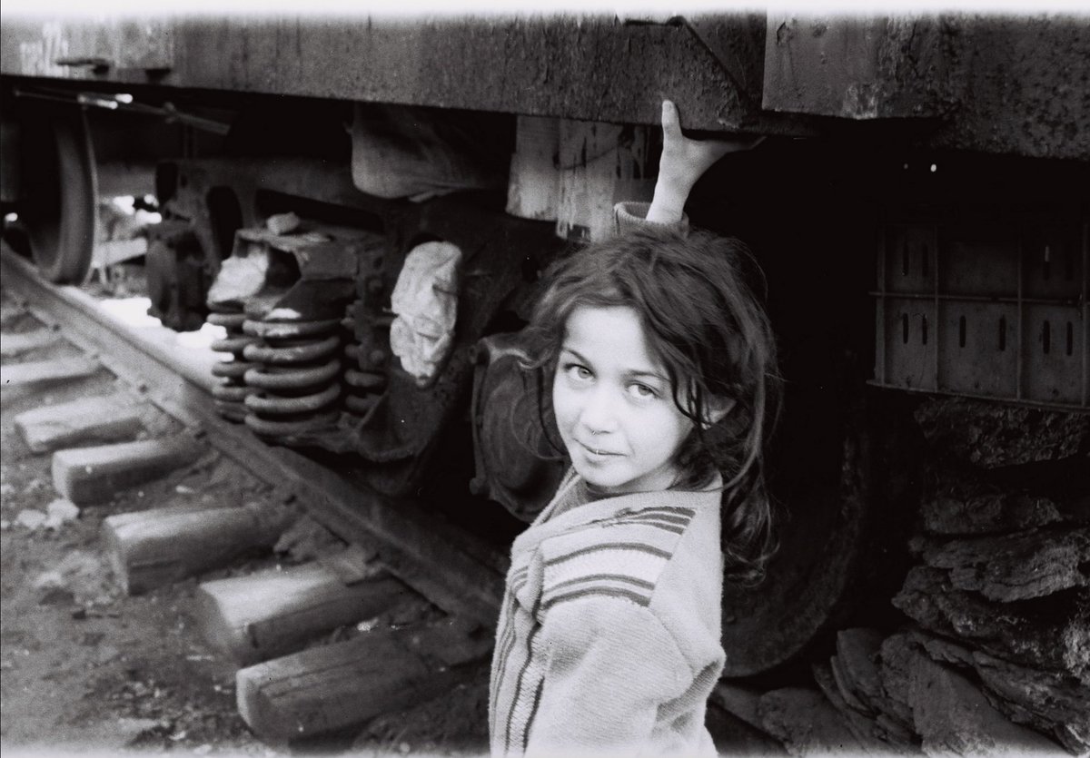 Azerbaijani girl living in a train car at an IDP settlement in Sabirabad, Azerbaijan. 1990s.

As a result of Armenia's invasion &amp; occupation of sovereign Azerbaijan in 1992, over 700,000 Azerbaijanis were forced to live in IDP camps &amp; train cars across the country. #NeverAgain