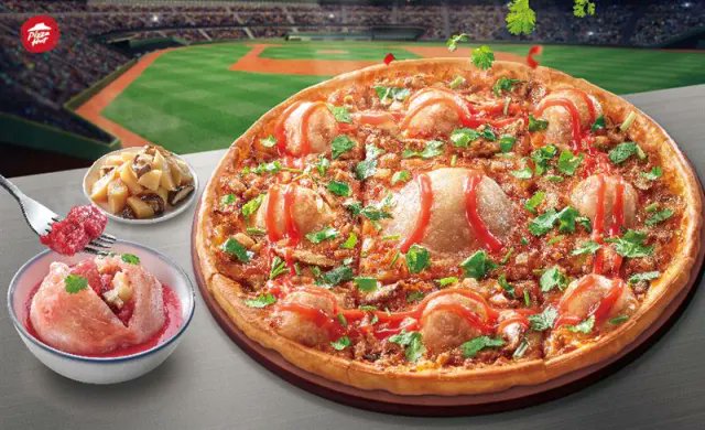 wordsfromtaiwan's tweet photo. We have entered the era of #bawan pizza (glutinous meatballs stuffed with pork and bamboo) topped with sweet chili sauce, cilantro, and cheese #Taiwan https://t.co/mYpikAhkMl
