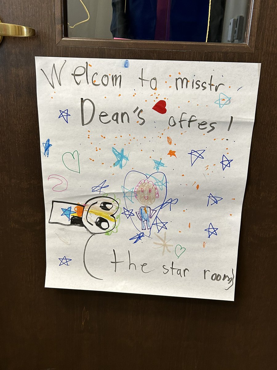 DeanJimMcIntyre's tweet photo. Loved having children of faculty on campus today! (Belmont had classes, while local K-12 schools were closed.) I even got a new sign for my door! My portrait includes a very flattering rendering of my curly pink hair!๐คฃ @drfoxatbu #MrDean https://t.co/i0sYS7xCPt