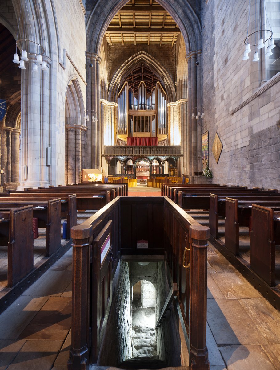 Beneath Hexham Abbey is the Anglo Saxon crypt which is 1300 years old. In part it is built from Roman stone - some of it decorated with pattern. Wilfred built the crypt to hold relics, including those of St. Andrew brought back from Rome in 679.