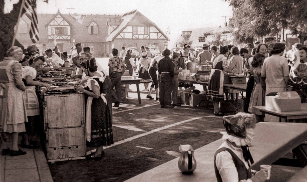 Solvang's rich heritage dates back to 1911, when adventurous Danish-Americans from the Midwest traversed the plains to establish a settlement in the Golden State of California. 

Fun fact: Solvang means "sunny field" in Danish.

Photos courtesy <a href="/elverhojmuseum/">Elverhoj Museum</a>