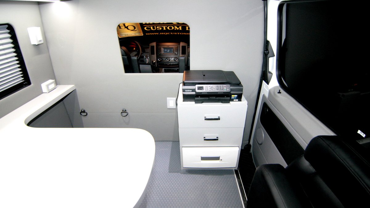 HQCustomDesign's tweet photo. This Mobile Office offers a dual workspace for conducting daily office tasks, with a built-in desk and fold-away 3-point seat. It also has a printer, ample storage and cabinet space, private window shades, outlets, and interior lighting. 
https://t.co/bpoG9eA9nF https://t.co/vJaf6QTHpf