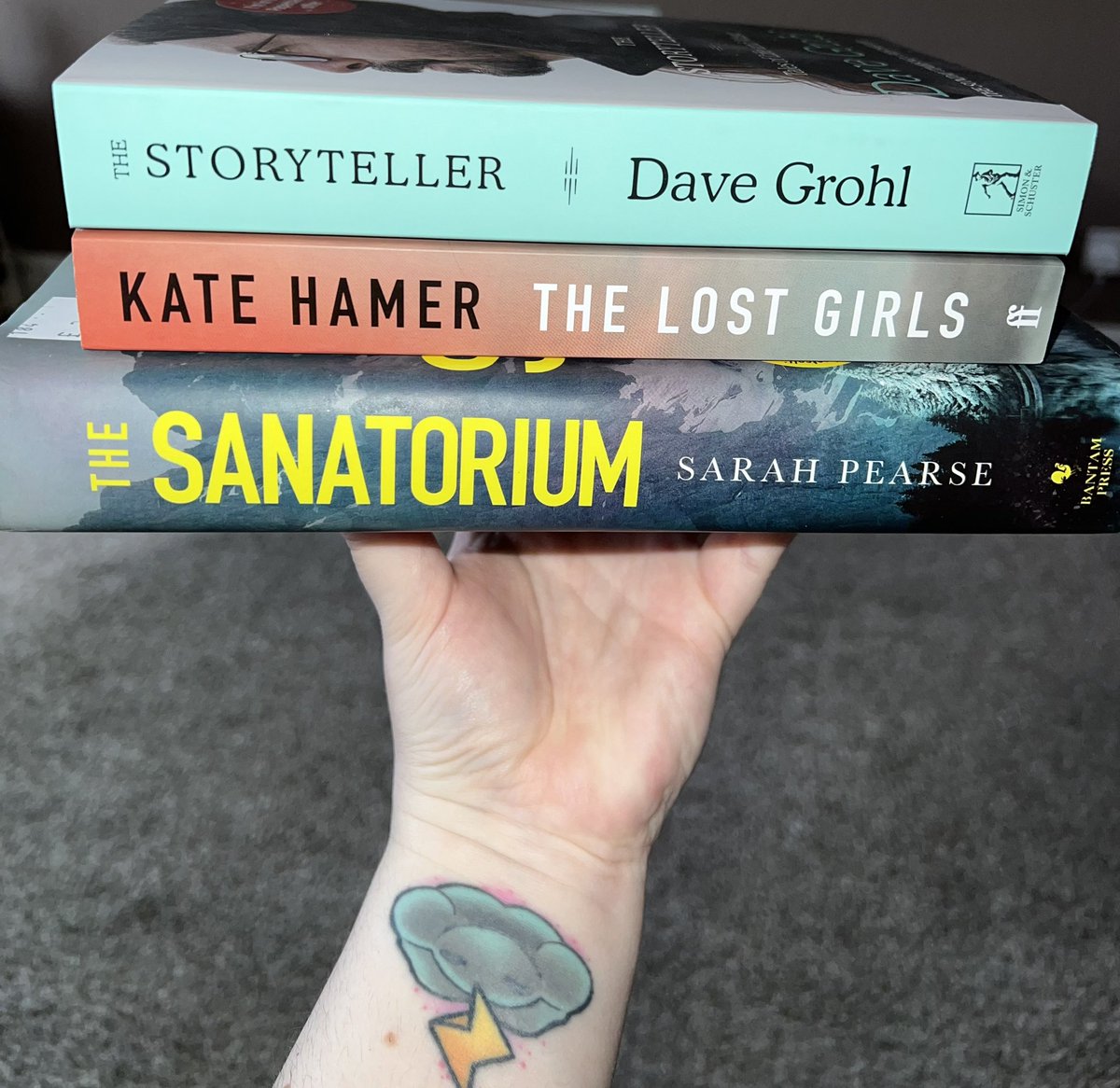 And it’s #BallsToTheBacklog!  Never gonna BEAT the backlog if I keep buying more books!  The Sanatorium was a charity shop mega-bargain 😀  

(picture apparently also stars one of my Super Mario themed tattoos … I can’t be bothered cropping 🤷‍♀️)

#BookTwitter