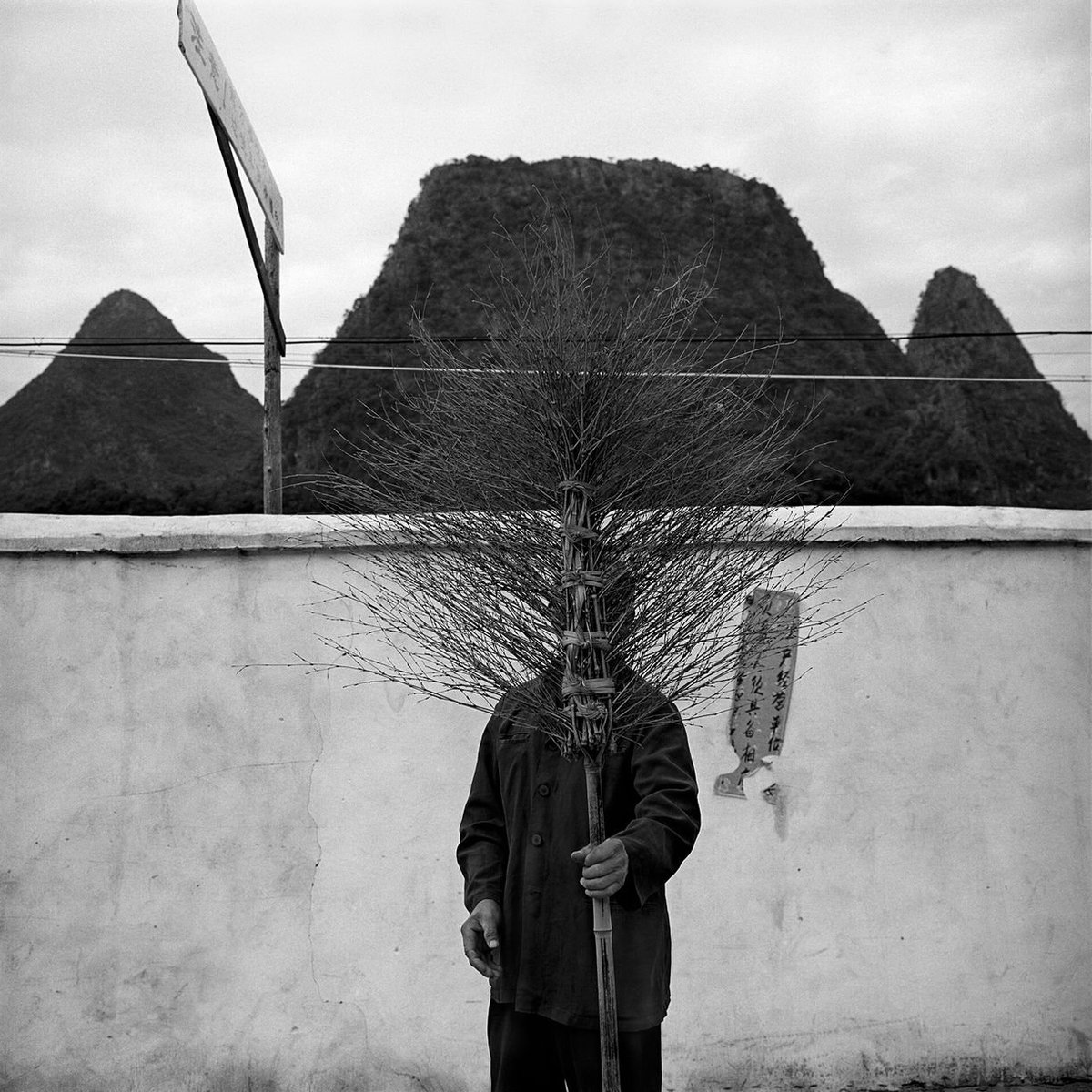 This unique portrait ‘Man and Rake’ taken by Nordic photographer Tore Sandahl was also highly commended in the #Portraiture category. Judge #BettyYao described the image as “A simple but surreal portrait that stayed in my mind from the first round of judging.” #PortraitPhotograph