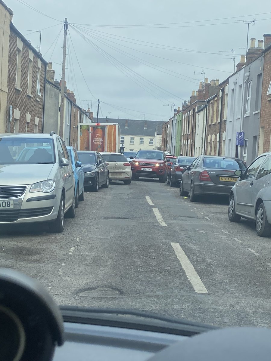 SarahP_SEND's tweet photo. Apparently @CheltenhamBC don’t know about this ridiculous diversion of traffic in St Paul’s. A diversion with a million signs that lead both ways through a small residential road that is only wide enough for one vehicle. Road works company can’t move as subcontracted. #shitshow https://t.co/o7EQYilGse