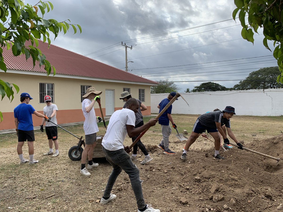 Regis_Service's tweet photo. Day 2: (part 2) Hard at work at Jerusalem @MustardSeedComm the dirt pile is decreasing! @RegisHighSchool https://t.co/tZXpHVh3ai