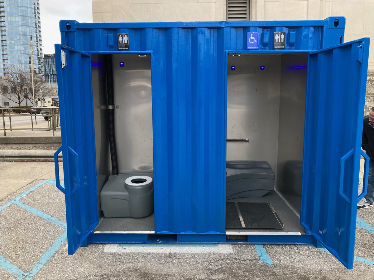 IndyOPHS's tweet photo. Downtown neighbors, both sheltered and unsheltered, can now take advantage of the new public restrooms at our Safe Distribution site, Old City Hall.  Painted Indy blue, these restrooms feature hand washing stations, plus 5min timed-locks and purple light. https://t.co/G02x5OkVE4