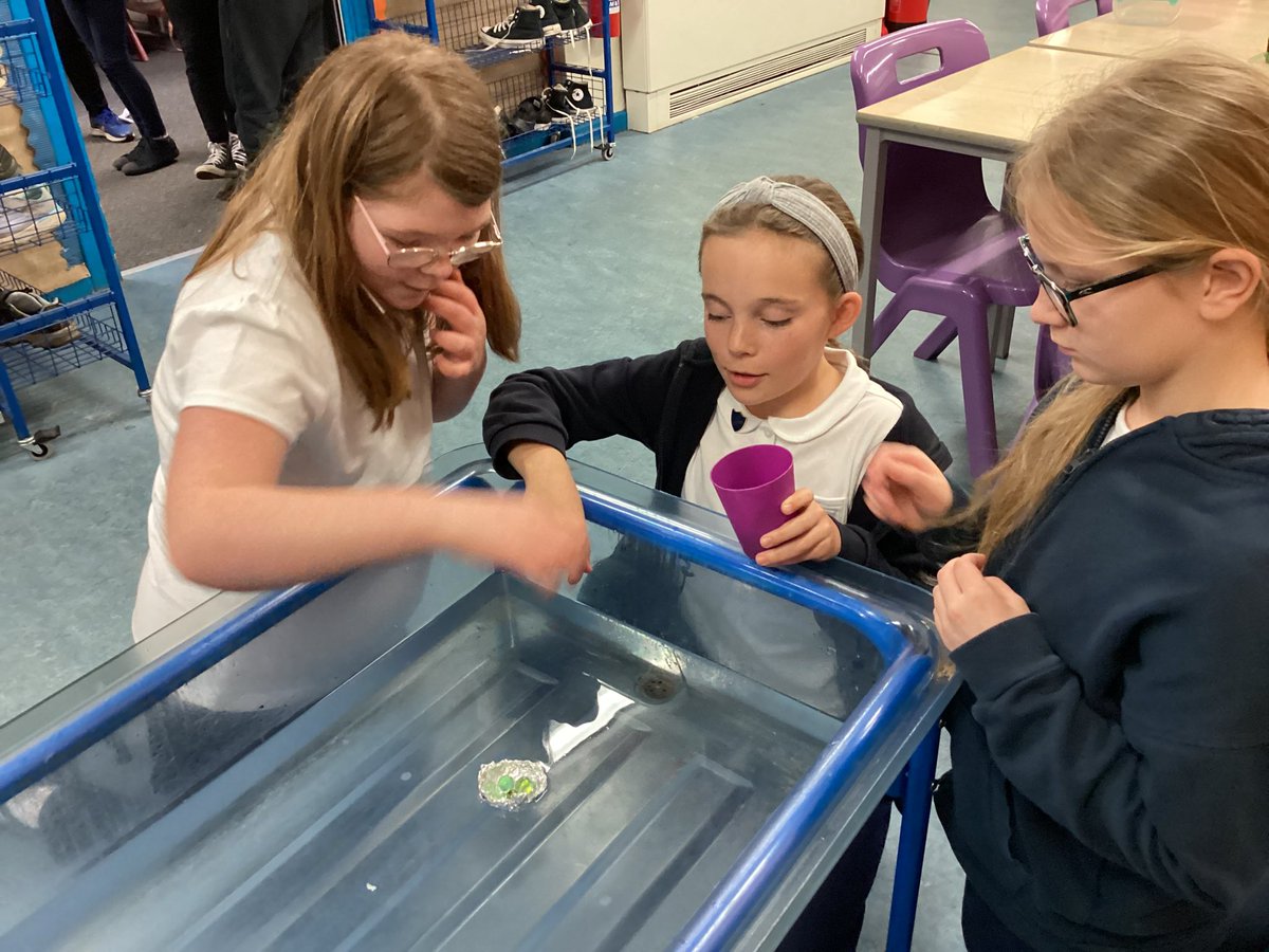 CarmondeanP3's tweet photo. Primary 6 have been learning about buoyancy in Science 🛶 We were tasked with making a boat out of tinfoil and seeing how many marbles would fit into it before sinking. We discovered that density and surface area were very important! @carmondean_ps #STEM #forces https://t.co/zQjOqMAgEO